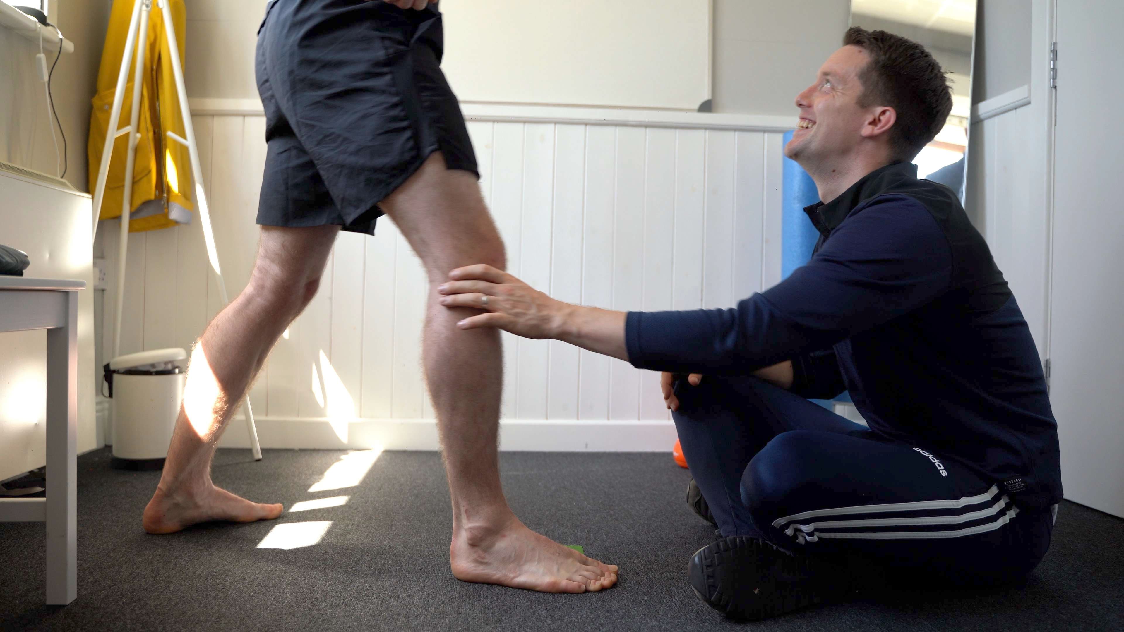 David working with a client in clinic